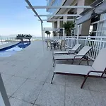 Book Santos Unlimited 817 Elegancia Vista Mar